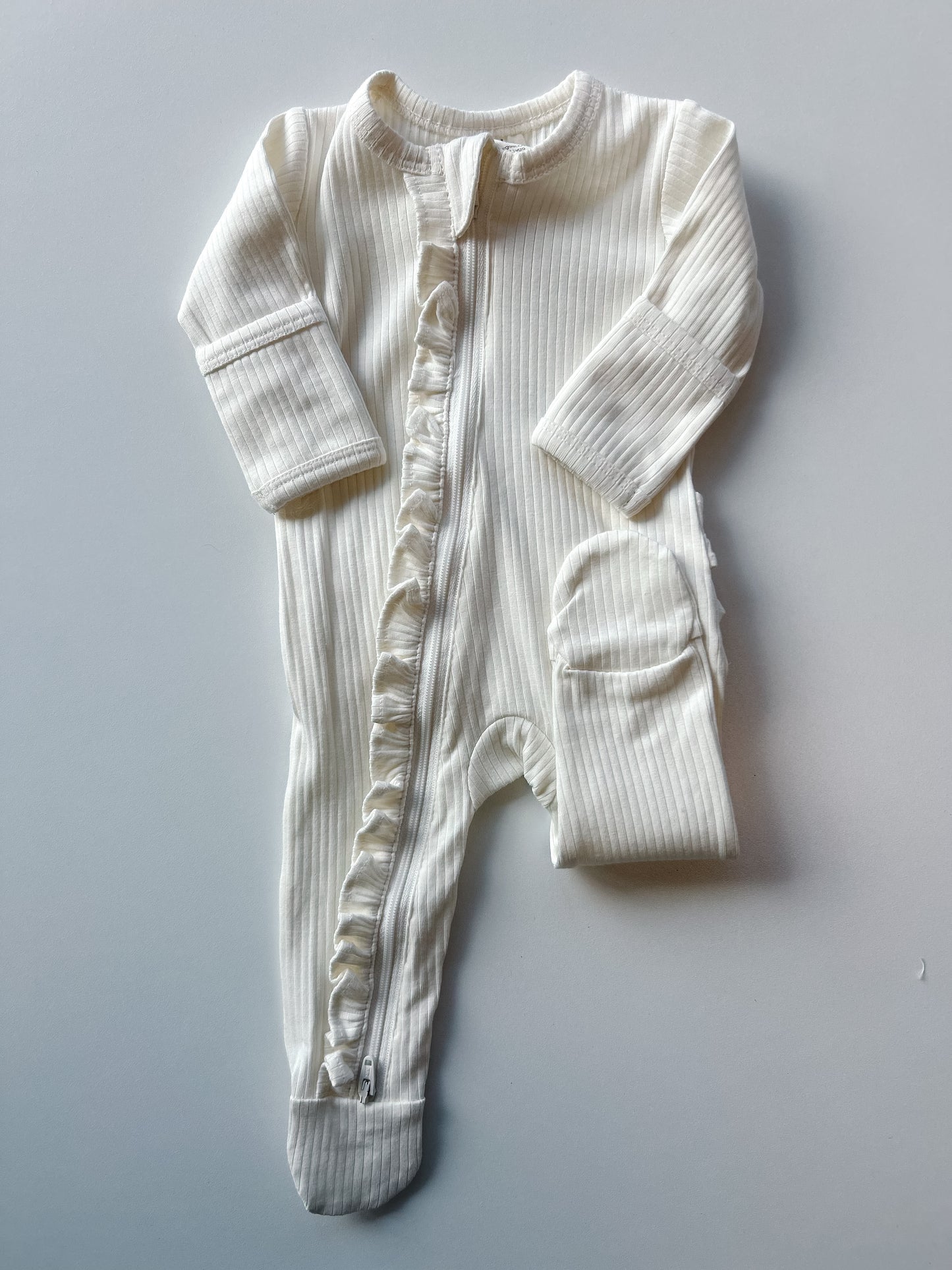 Ivory Ribbed Frill Zip Footie