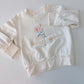 Ruffle Hem Sweatshirt